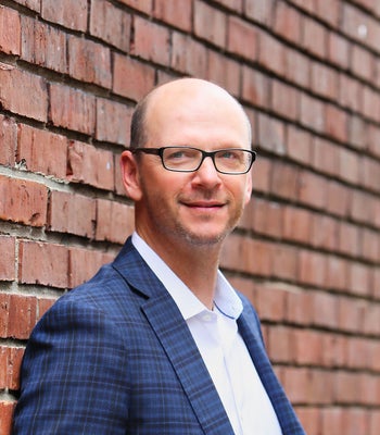 Portrait of Rick Gendreau, Management Director .