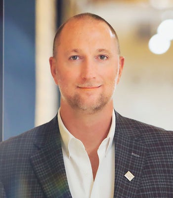 Portrait of Patrick Carson, Director of Business Development - Urban Realtor.